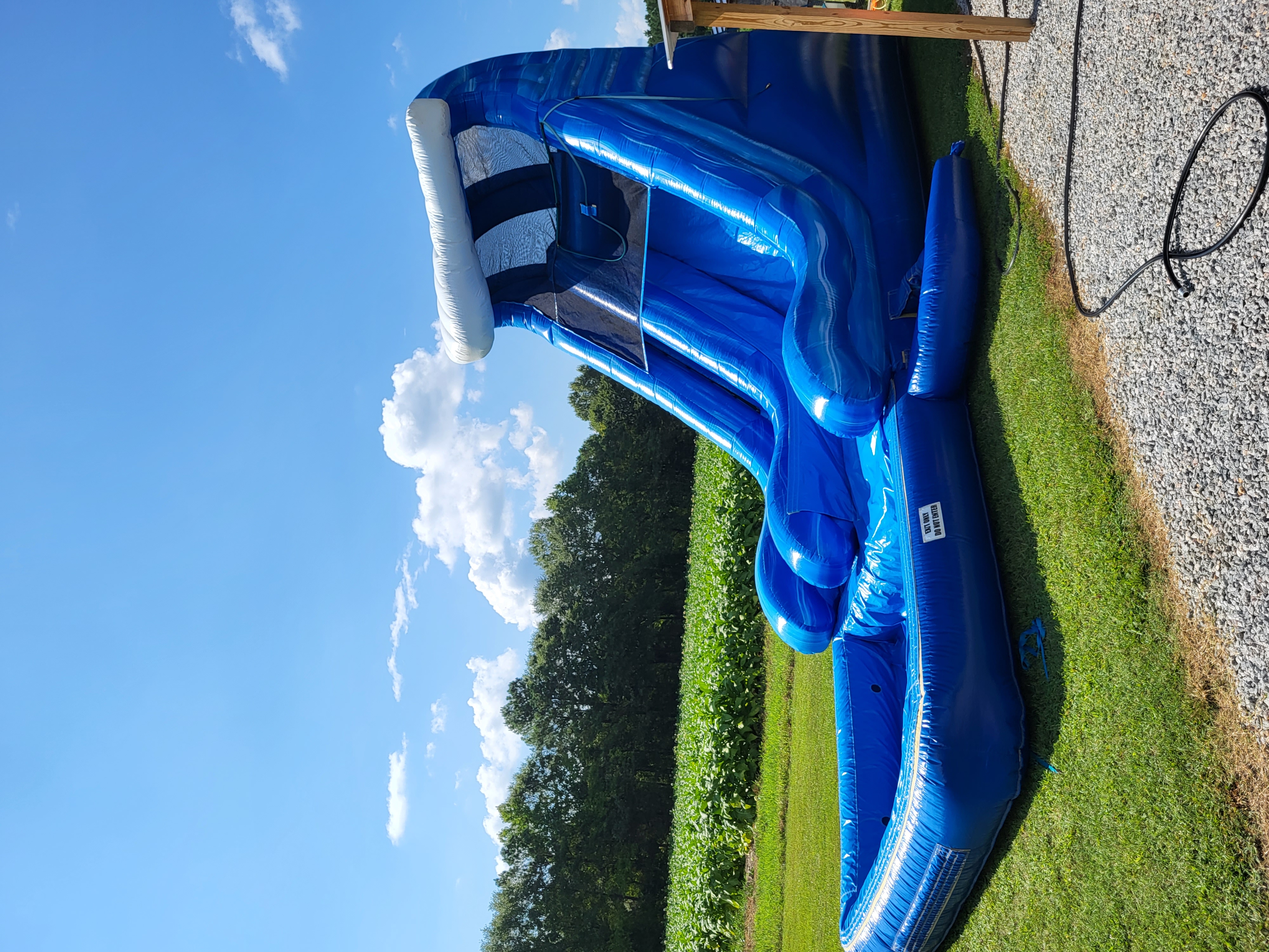 Blue marble 18 ft waterslide. Waterslide rental Clayton NC